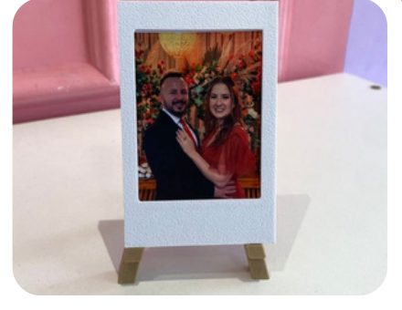 Polaroid com tripé